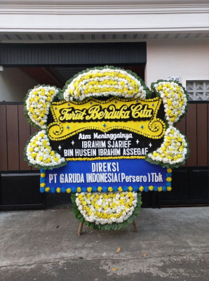 Papan Bunga Duka di Moba