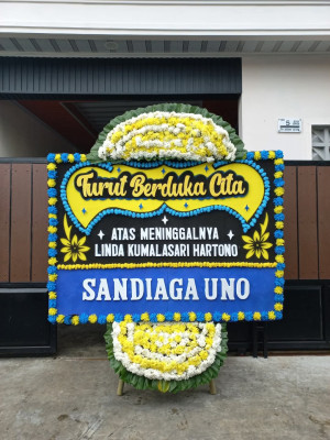 Papan Bunga Duka di Moba